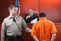 bailiff escorting defendant 