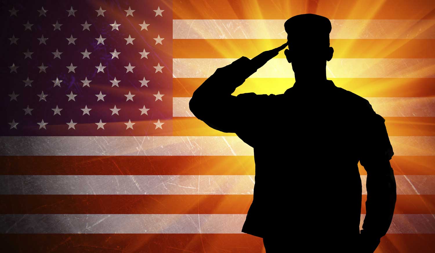saluting male army soldier on american flag background