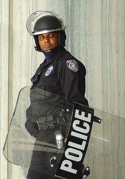 Police officer in riot gear