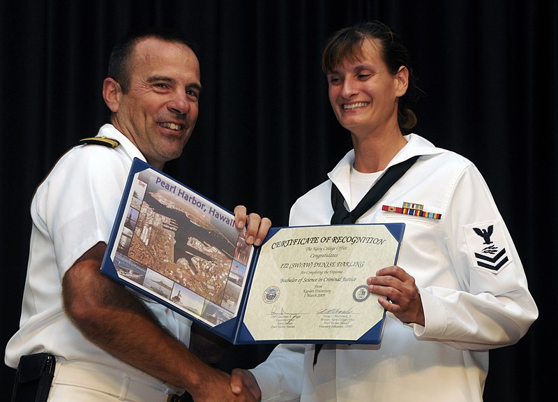 US Navy 091029-N-7498L-066 Information Systems Technician 2nd Class Denise Darling received the certificate of recognition for completing her bachelors degree in Criminal Justice with emphasis in cyber crime